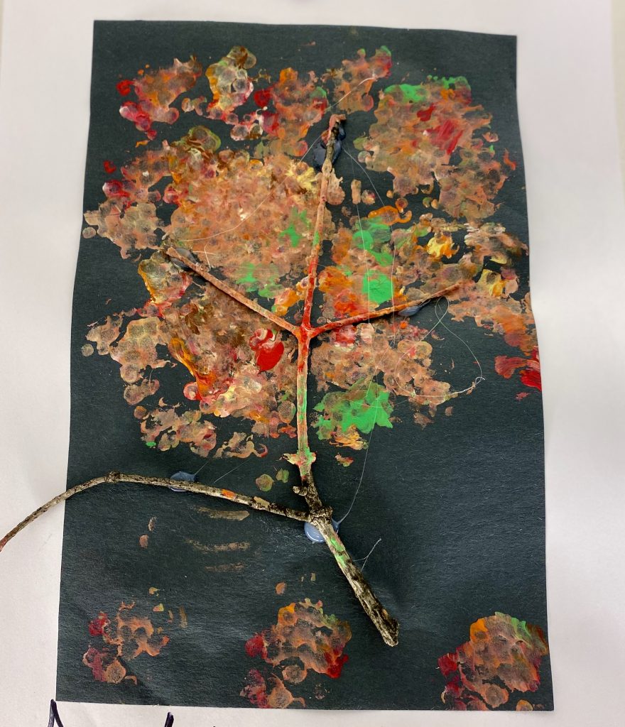 Our Toddler Oak Class showing their appreciation for nature in art class