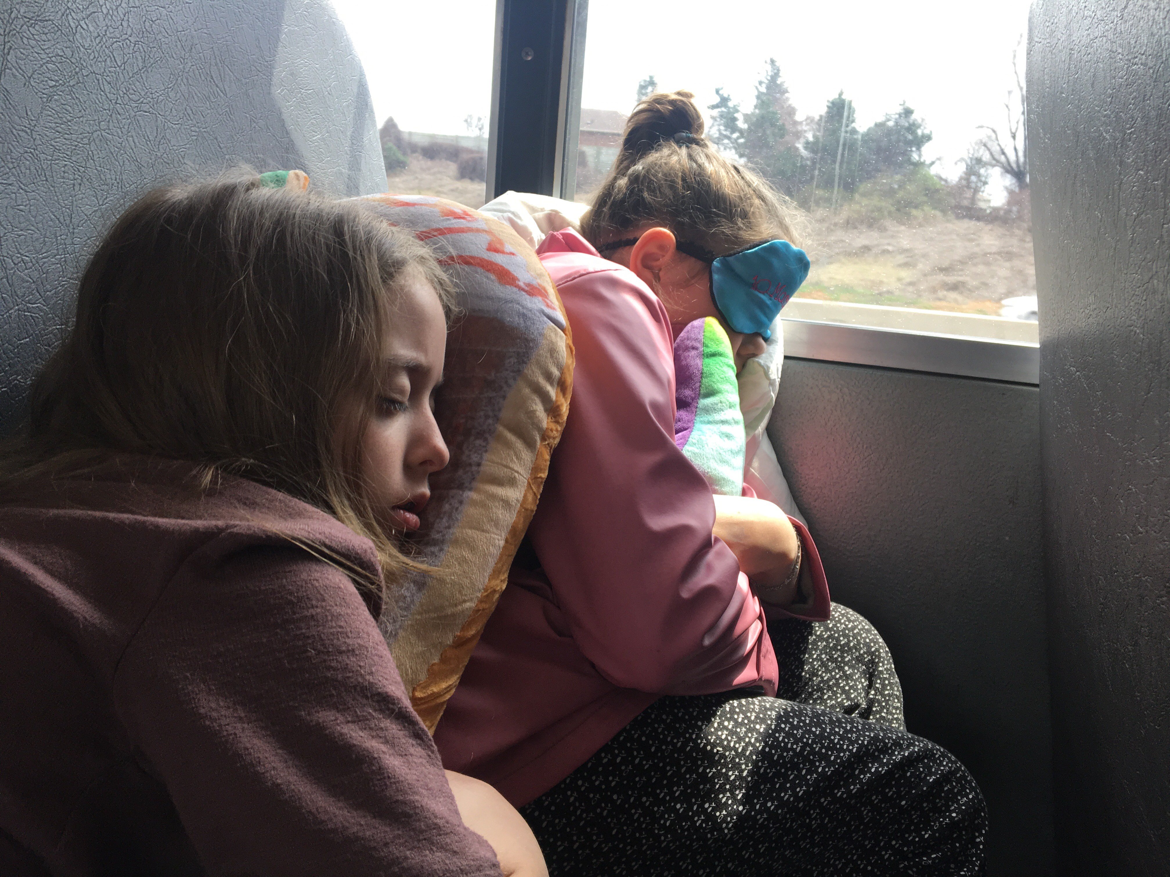 Students sleeping on the bus