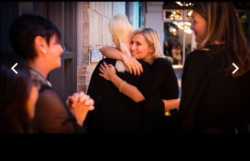 Isabelle Kunicki greeting guests