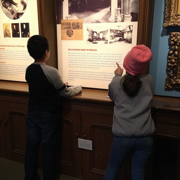 Students reading at Art Gallery of Ontario