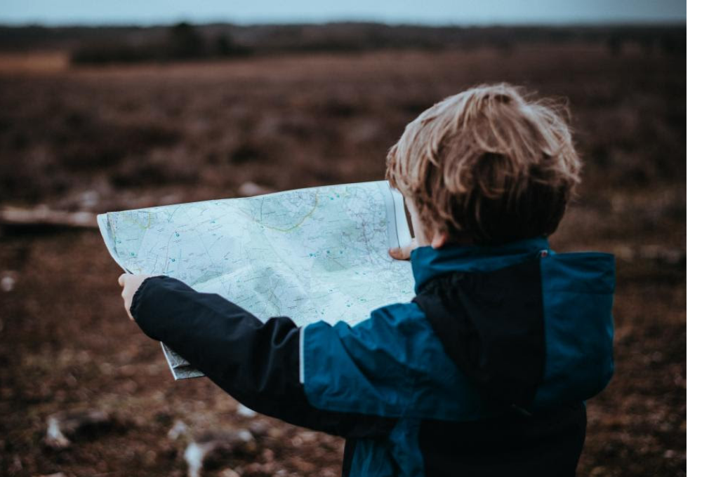 Child with a map