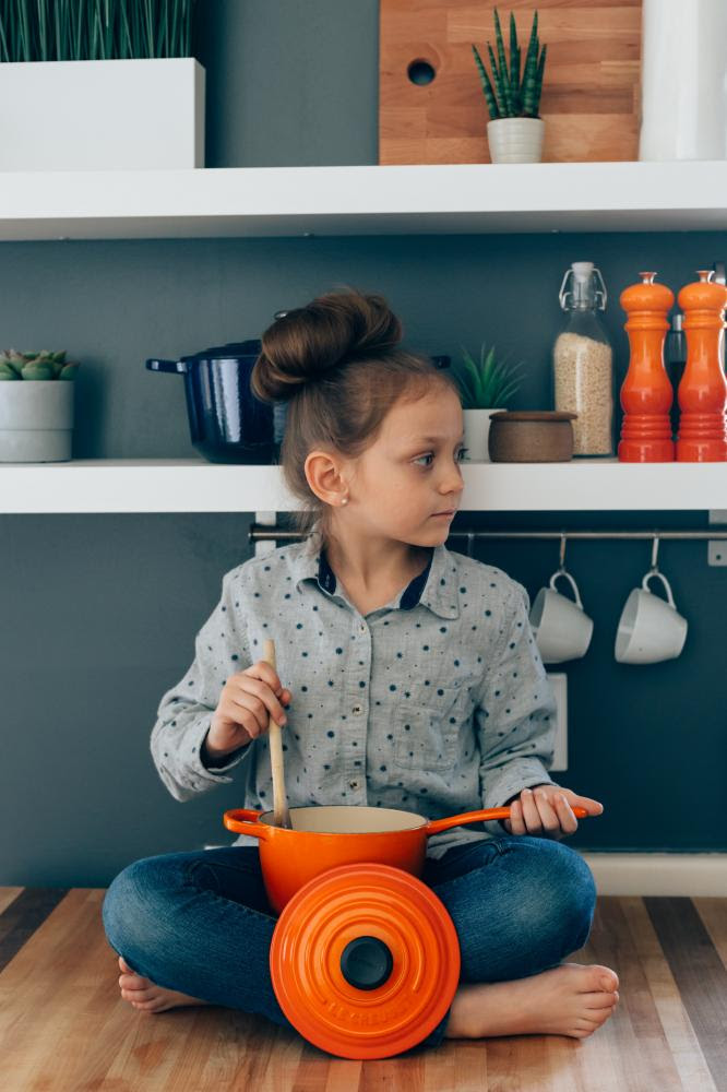 Stock Image of Child stirring